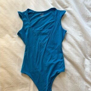 Women’s blue bodysuit